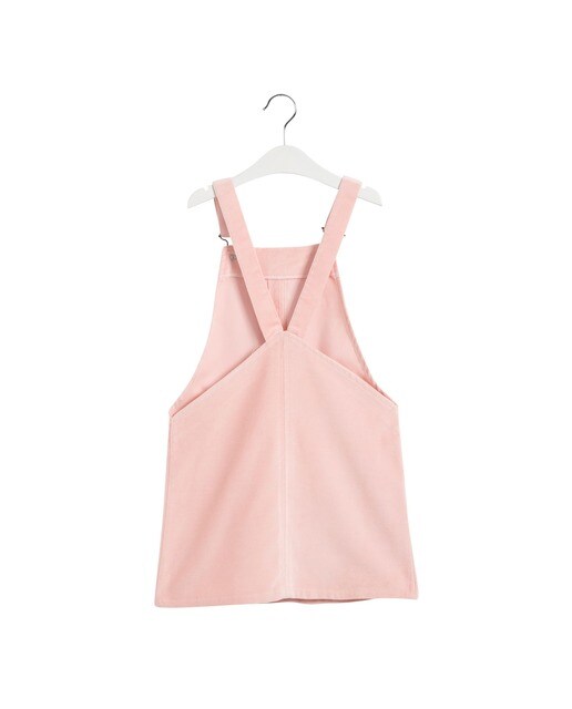 Peto de niña Sainte Claire de terciopelo en rosa Peto de niña Sainte Claire de terciopelo en rosa