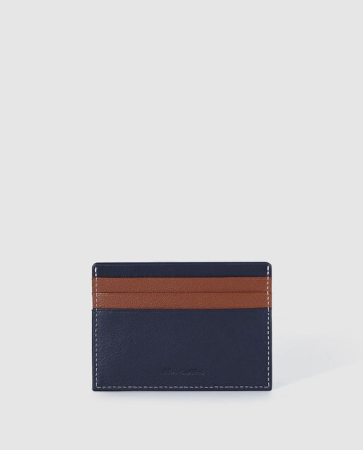 Porta-cartões de homem Emidio Tucci em pele azul-marinho com logótipo pespontado Porta-cartões de homem Emidio Tucci em pele azul-marinho com logótipo pespontado