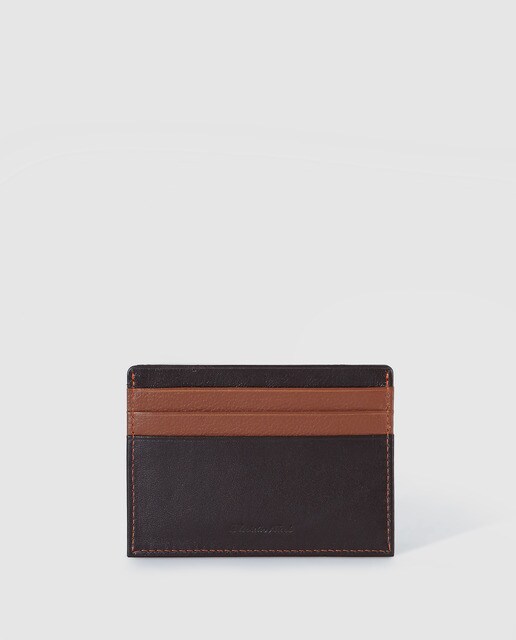 Porta-cartões de homem Emidio Tucci em pele castanho-escuro e com logótipo pespontado Porta-cartões de homem Emidio Tucci em pele castanho-escuro e com logótipo pespontado