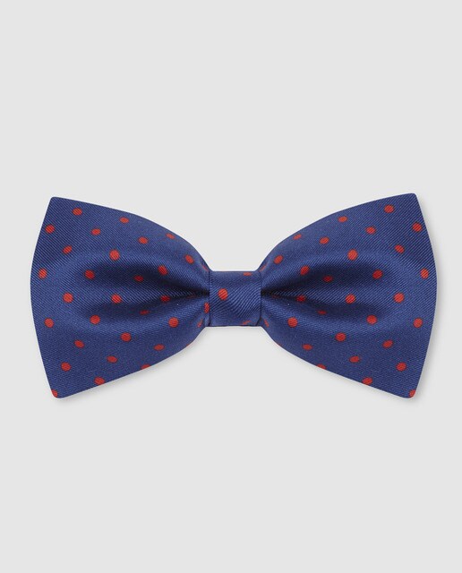 Laço de seda azul royal com estampado às bolinhas vermelhas.