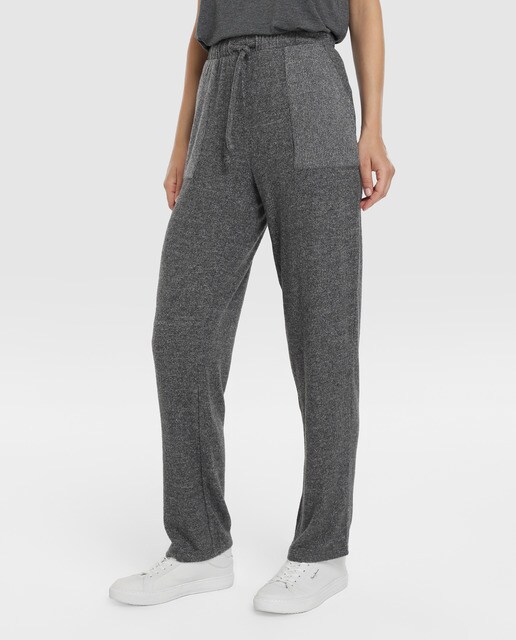 Calças compridas cinzentas de mulher