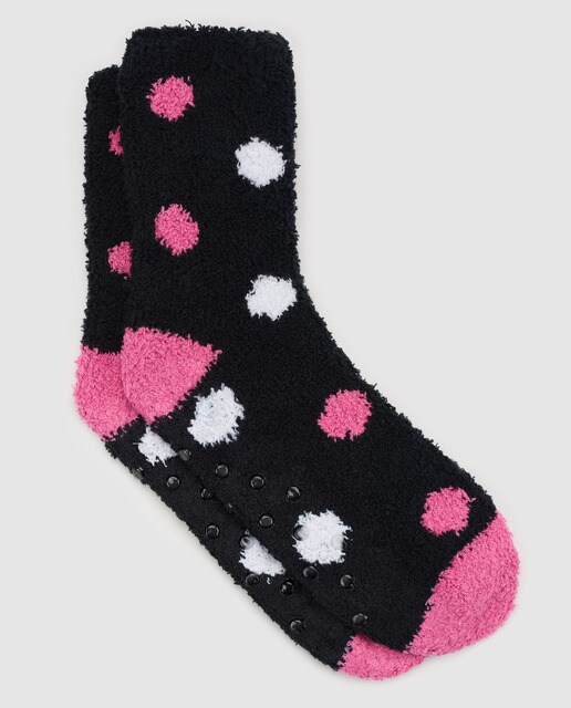 Meias pretas às bolinhas