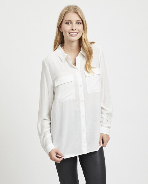 Camisa de mulher com manga comprida e bolsos