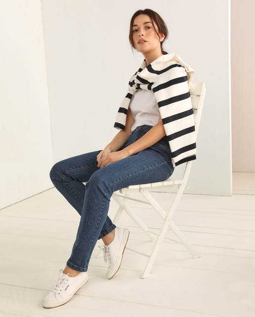 Jeans skinny de mulher com cinco bolsos