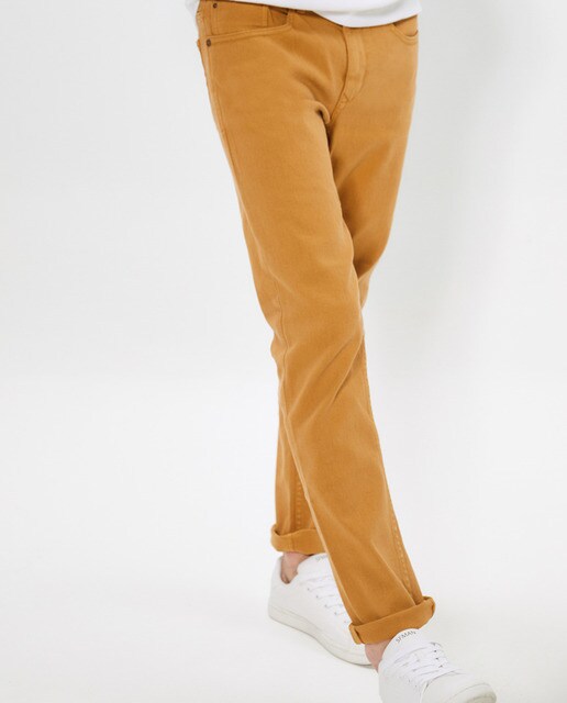 Jeans slim mostarda