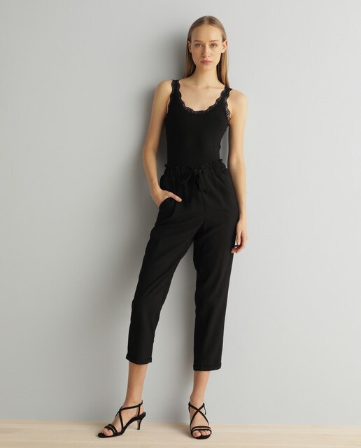 Calças fluidas com laço Calças fluidas com laço