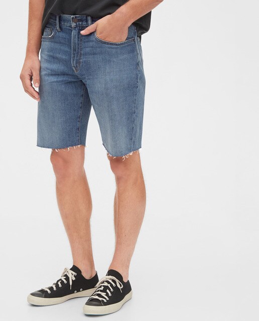 Bermudas de ganga azuis de homem