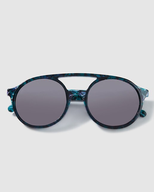 Gafas de sol de doble montura turquesa con lentes gris.