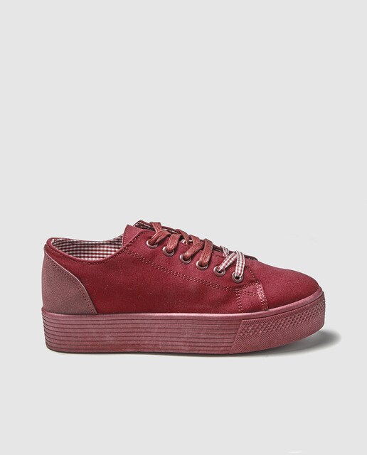 green and red trainers
