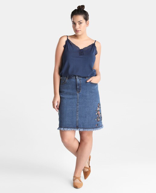 denim skirt with embroidered flowers