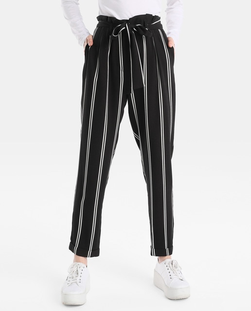 green and black striped trousers