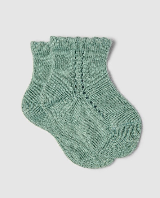 Calcetín calado de bebé Condor en verde