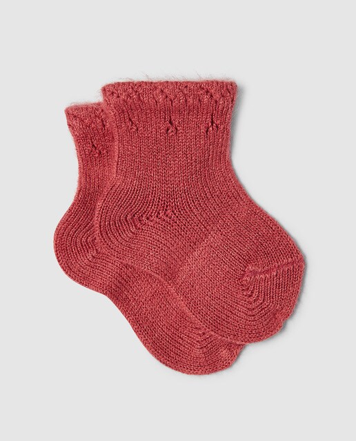 Calcetín calado de bebé Condor en fresa