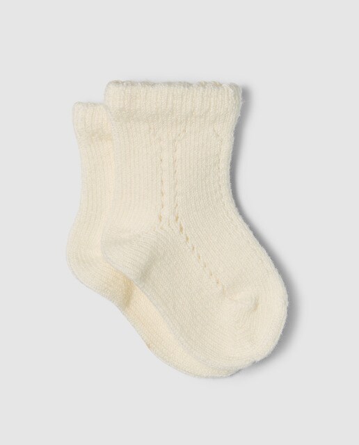 Calcetín calado de bebé Condor en crudo