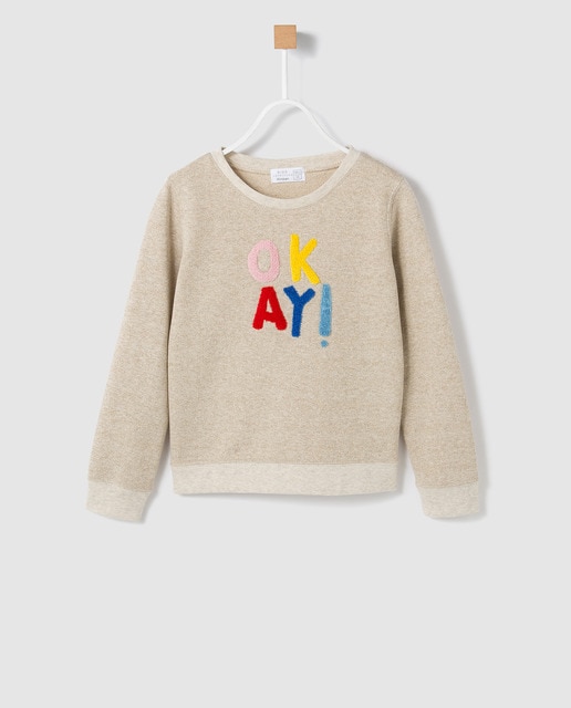 Sudadera de niña Brotes en crudo melange con patch
