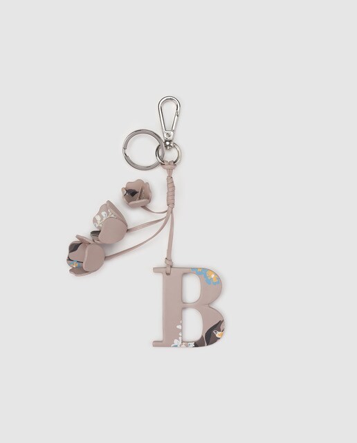 Porta-chaves de conta El Corte Inglés em pele em tom taupe com estampado floral e inicial B bordada