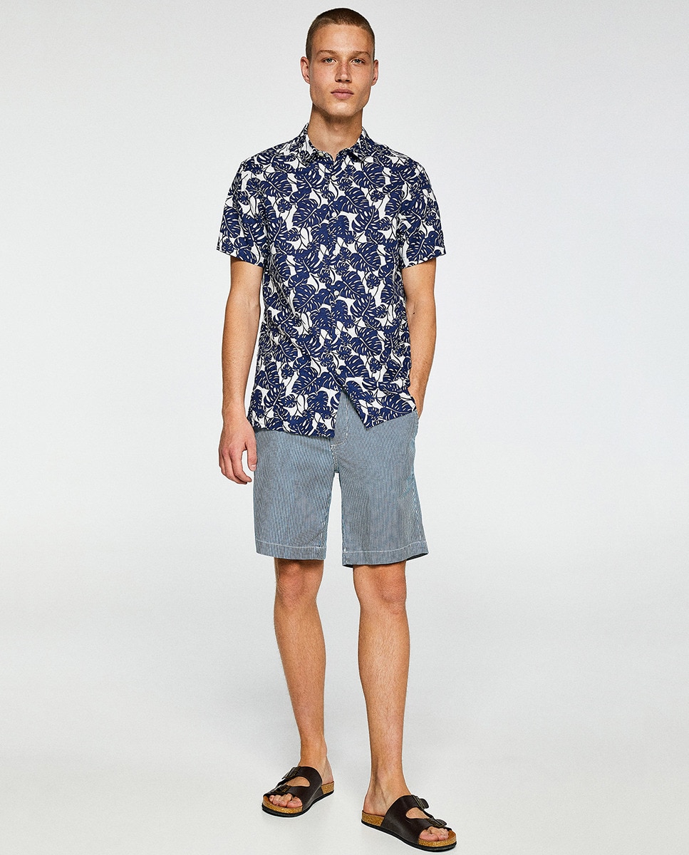 outfit bermuda azul marino hombre