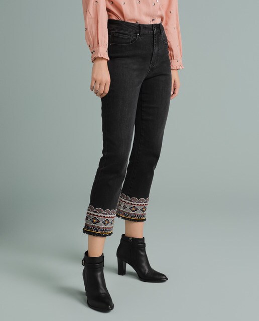jeans with embroidered hem