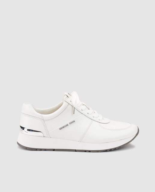 Zapatillas de mujer de piel Michael Kors en color blanco Zapatillas de piel de mujer Michael Kors de color blanco con