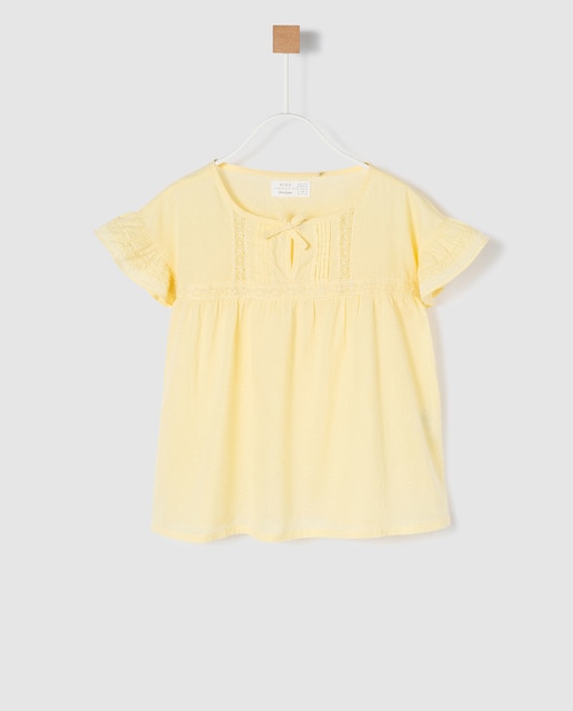 girls yellow blouse