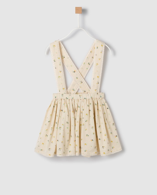 Falda de niña de flores con tirantes