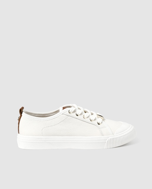white canvas lace up trainers