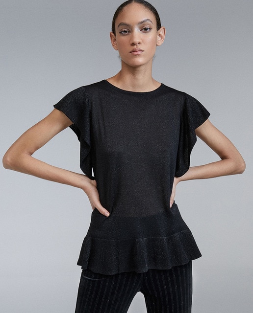 Top de punto de mujer con volantes