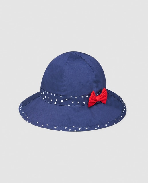 baby blue and red hat
