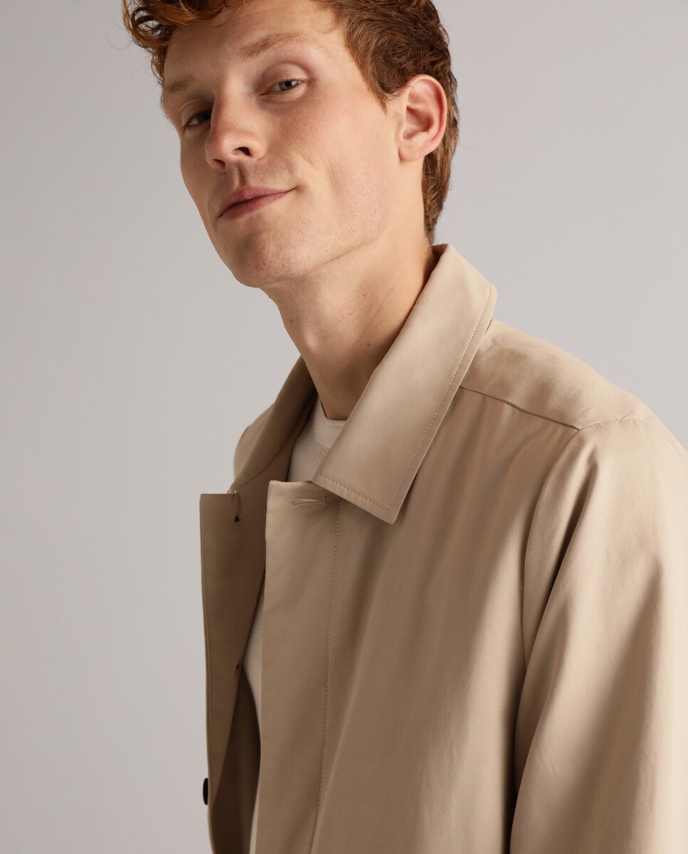 Imperméable beige avec poches