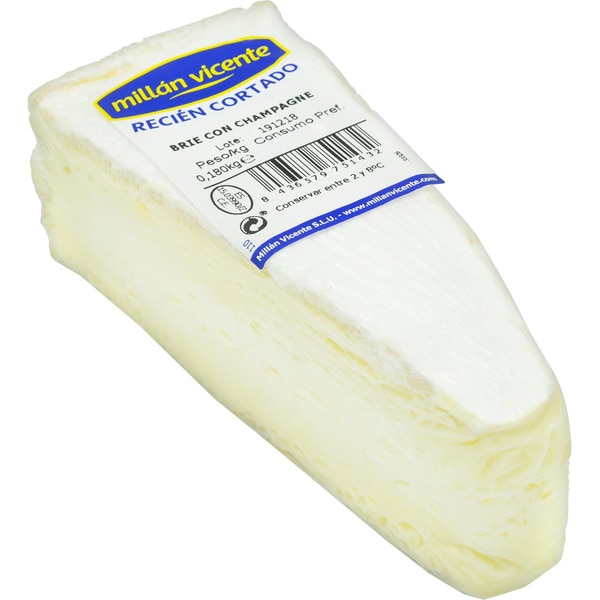 Freshly cut brie cheese with champagne wedge 180 g
