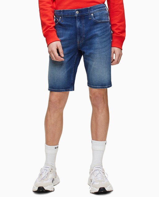 Bermudas de ganga azuis de homem