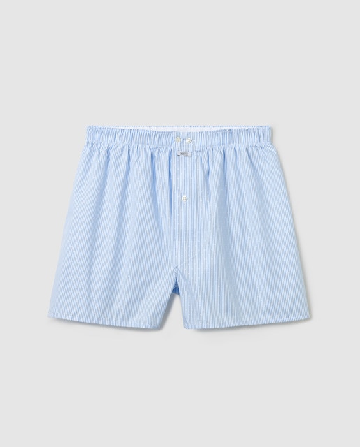 Boxers de tecido azuis de homem