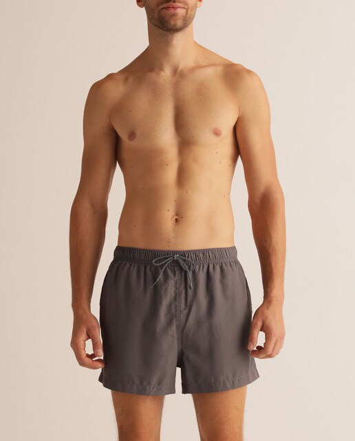 grey swimming trunks