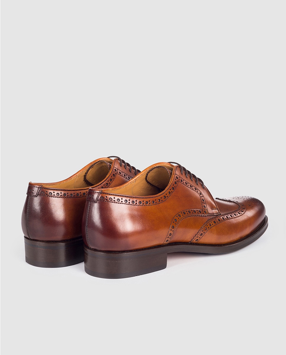 Magnanni men's brown leather laceup shoes with broguing · Magnanni