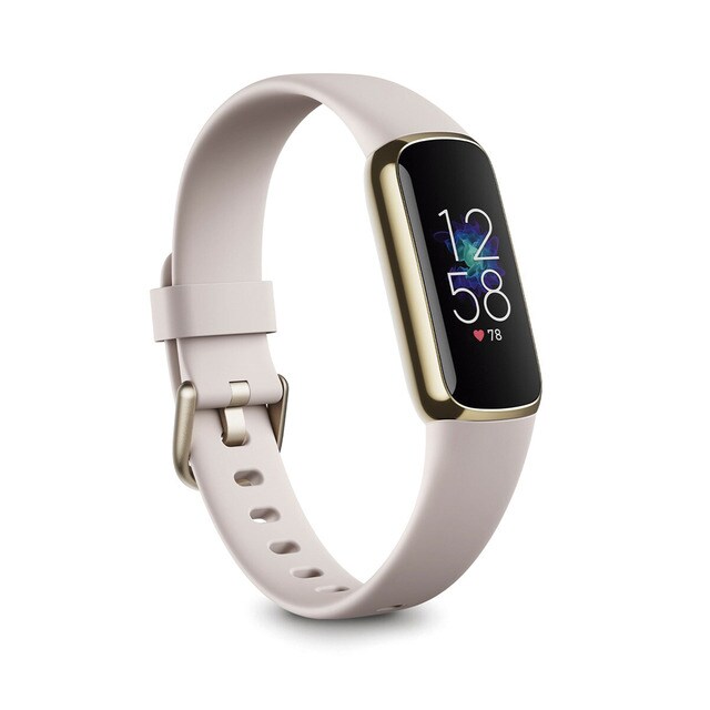 Fitbit Luxe gold stainless steel activity watch with ivory white strap