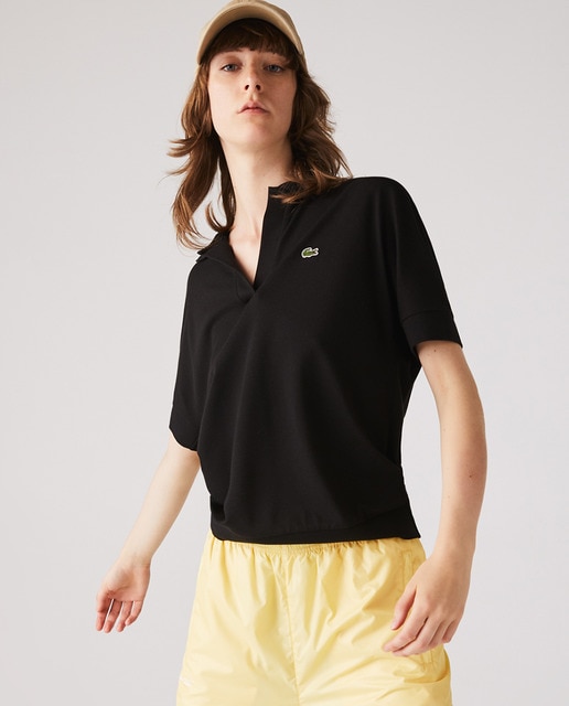 Women's shortsleeve fluid piqué polo shirt with a polo neck without