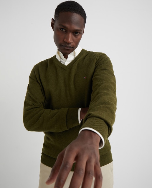 green sweater khaki pants