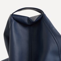 El Corte Inglés Pera faux leather pouf