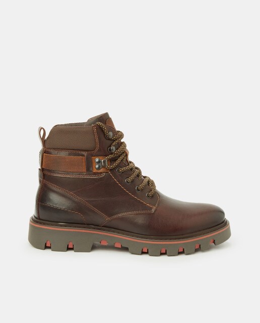 Men's dark brown leather ankle boots with a quilted turn-over