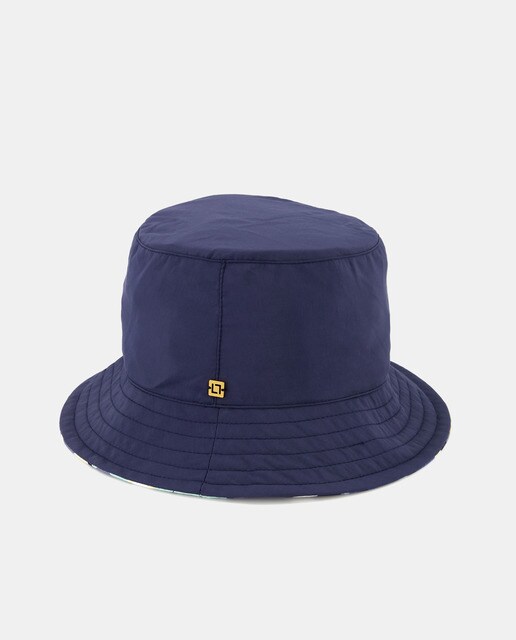 Reversible navy blue rain hat · Women's fashion · El Corte Inglés