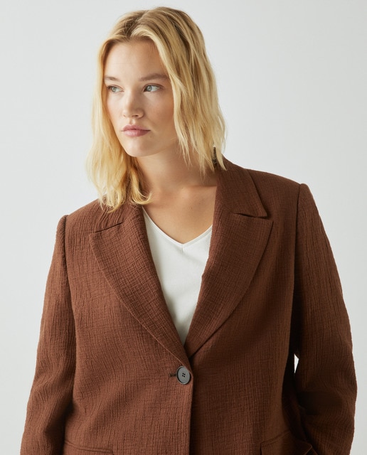 Women's plaincoloured blazer with side pockets · Women's fashion · El