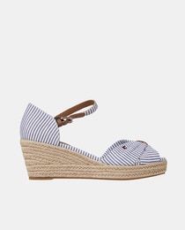 Women's pale blue espadrilles with stripe print, wedge and bow design