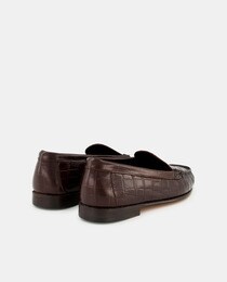 Women's brown leather loafers with crocodile embossing and leather sole