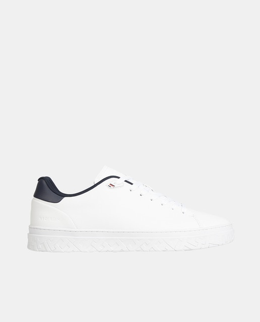 Men's low-top leather trainers with textured monogram sole