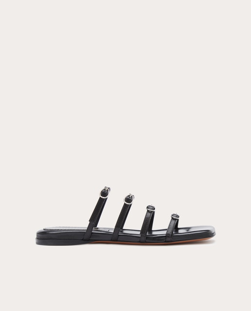 Sandalias planas de piel
