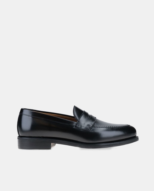 Berwick - Mocasines de hombre en negro de piel con adorno de antifaz y piso Dainite.