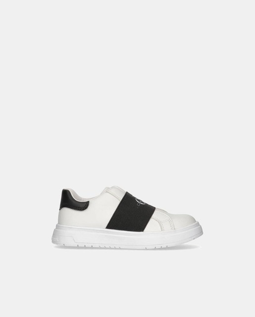 Zapatillas de niño en blanco bajas tipo casco con banda elástica logotipada