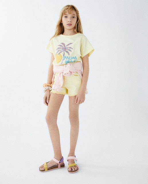 Short vaquero de niña con flecos