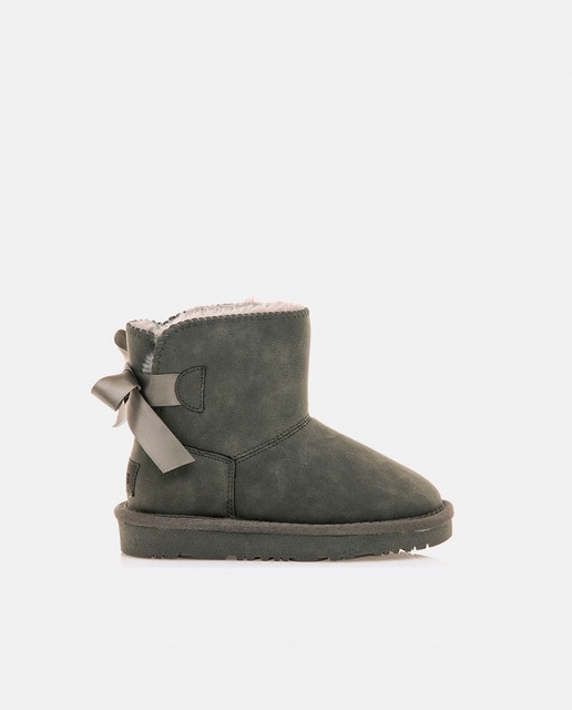 Botas de niña Mustang de color  topo con adorno de lazo trasero