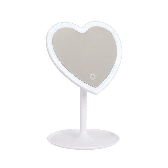 Espejo decorativo con forma de corazón y tira LED.